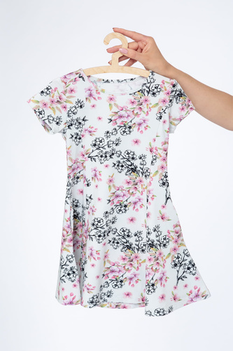 Kinderkleid Córka Milk & Love helles Blumenmuster ausgestellter Schnitt