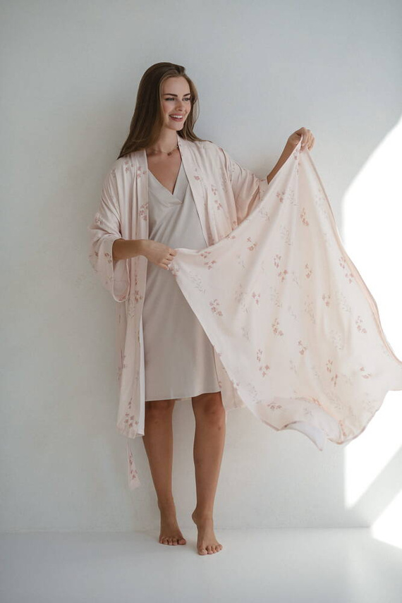 Blumen auf rosa Milk&Love-Bambuswickeltuch