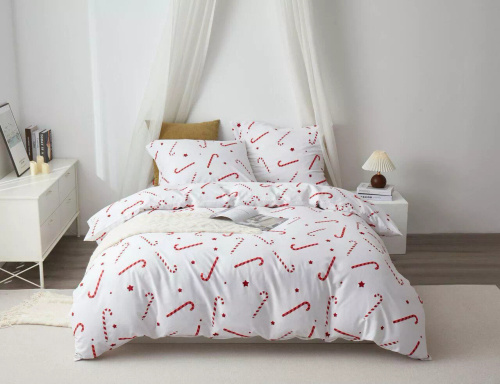 Weihnachtsbettwäsche „Candycanes“ aus Baumwollsatin von Spod Igliły i Nitki, weiß, rot, süß – elegant und weich