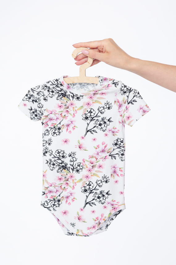 Babybody Milk & Love Blumen hell Baumwolle kurzarm