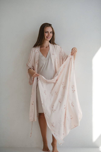 Blumen auf rosa Milk&Love-Bambuswickeltuch