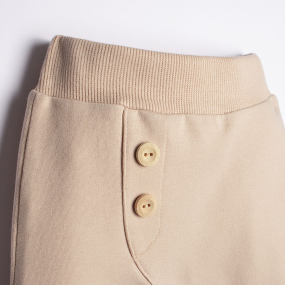 221273 Kiku Nicol beige Baby-Jogginghose mit Knöpfen